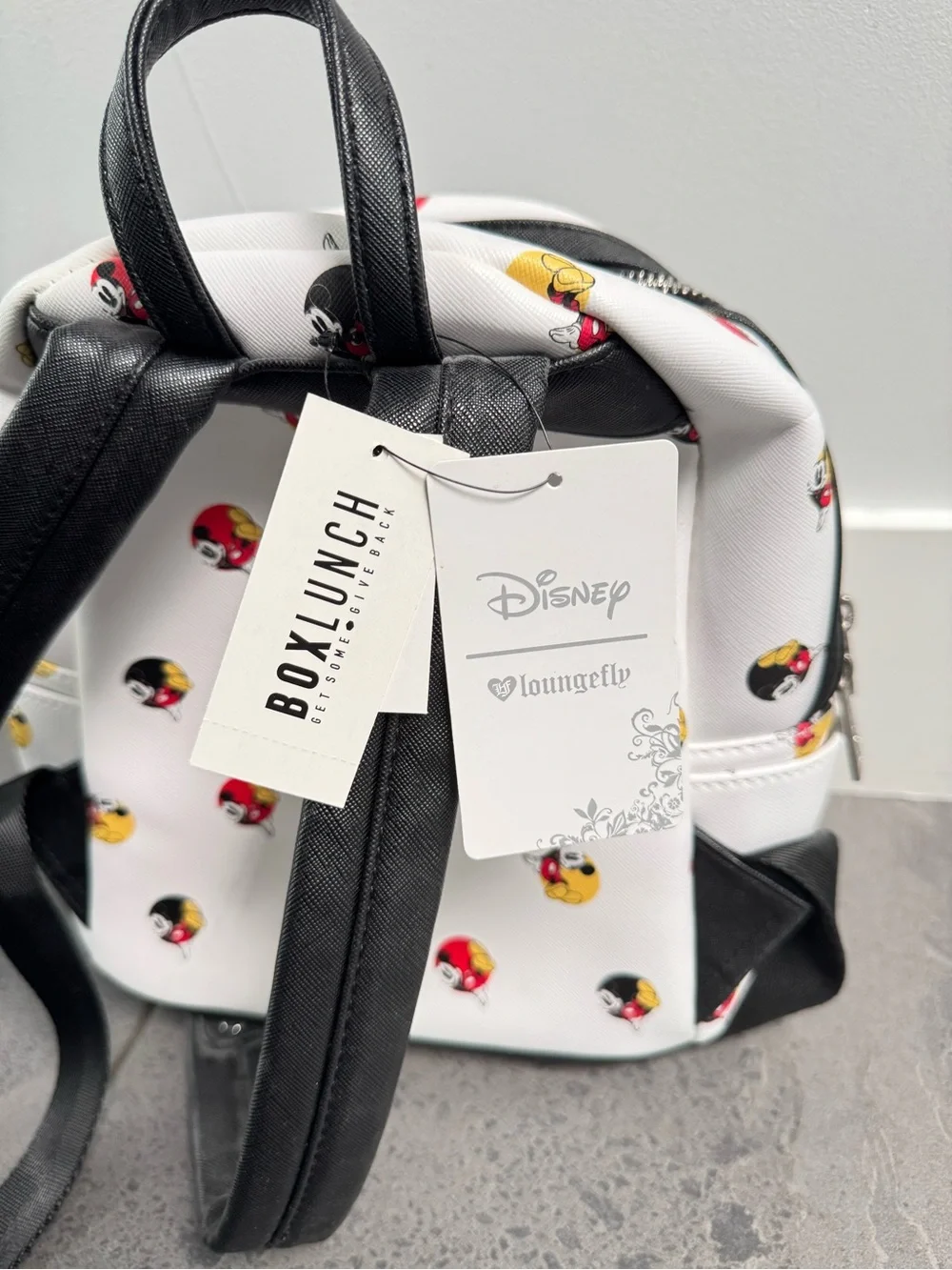 Loungefly Disney White Mini Backpack with Red and Yellow Mickey Icons